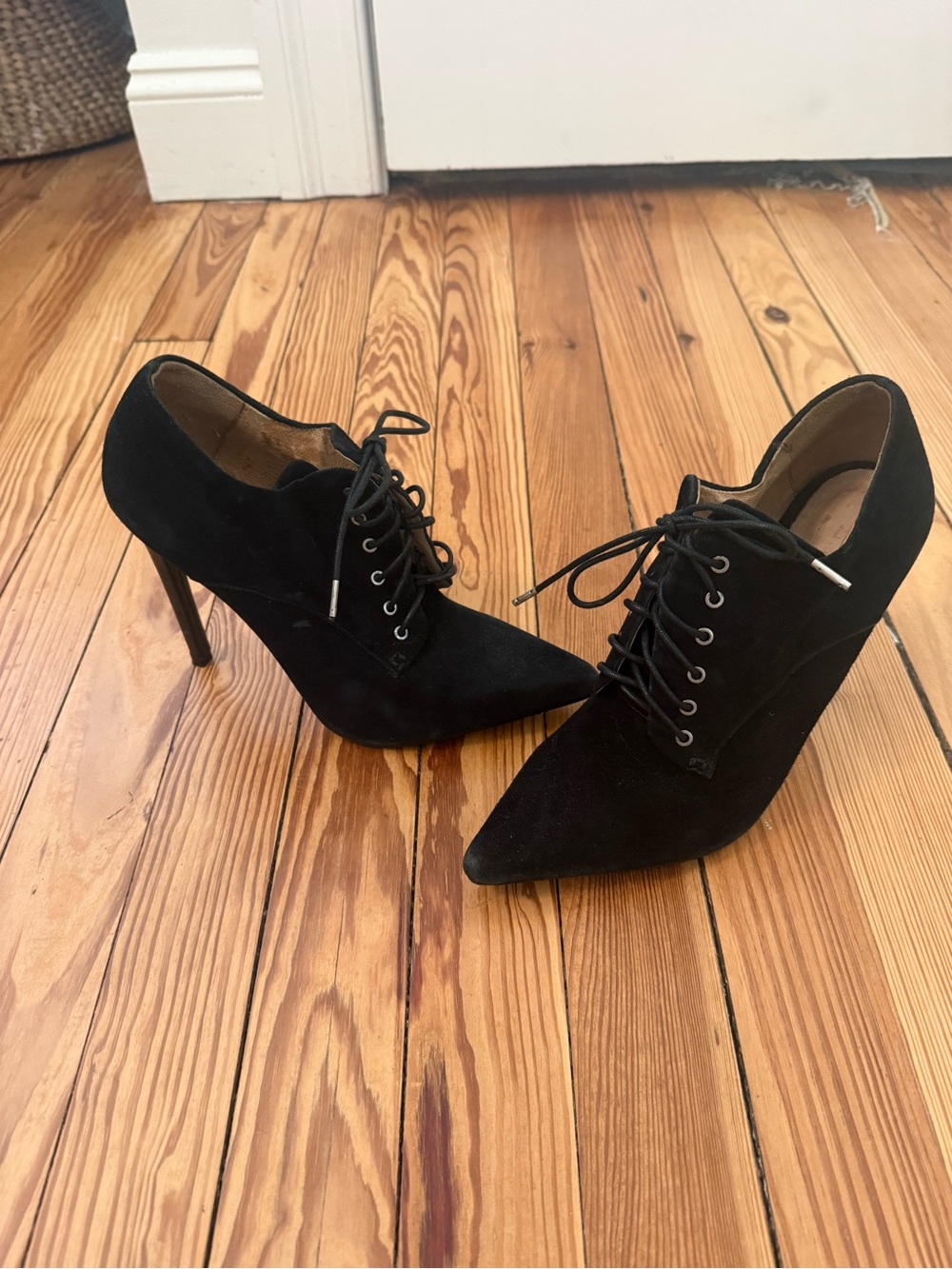Black suede high heel shoe